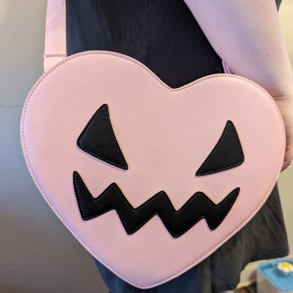 Em and sprout spooky pastel pink Jack o lantern heart shaped crossbody bag